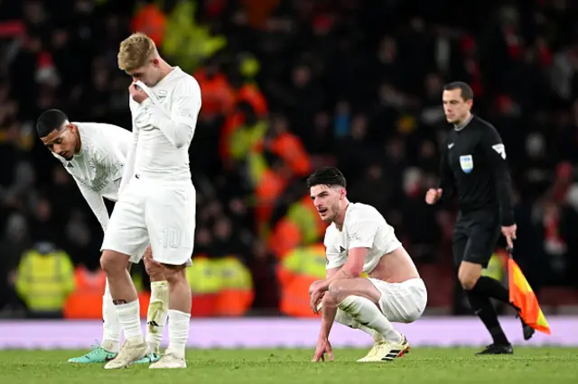 Declan Rice of Arsenal looks dejected after the team's defeat