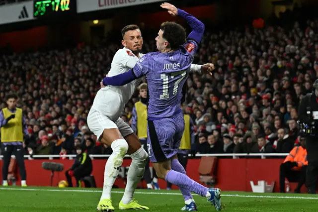 Ben White clashes with Liverpool's English midfielder  Curtis Jones