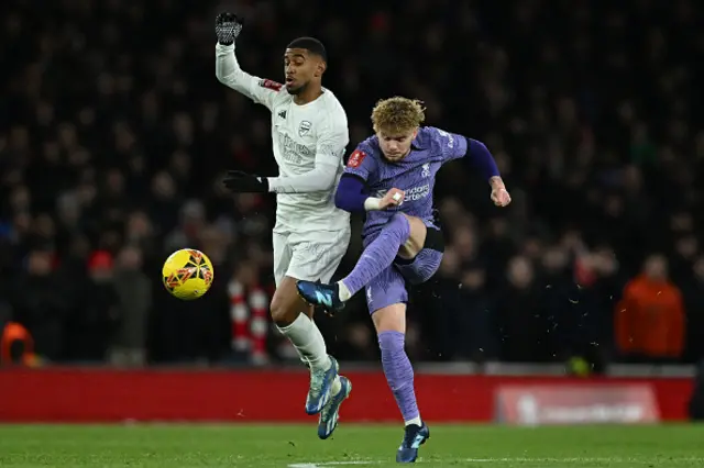 Harvey Elliott vies with Arsenal's English Reiss Nelson