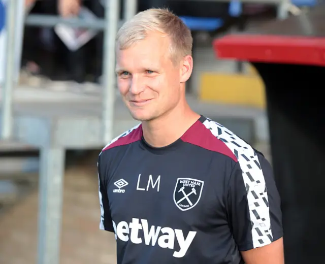 Liam Manning looks on during his time as a West Ham United