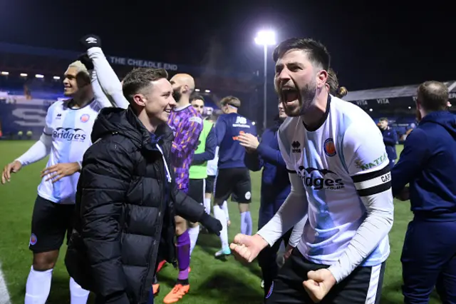 Aldershot Players celebrate after winning in the Emirates FA Cup Second Round