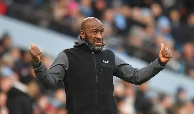 Huddersfield Town's Manager Darren Moore gestures on the touchline