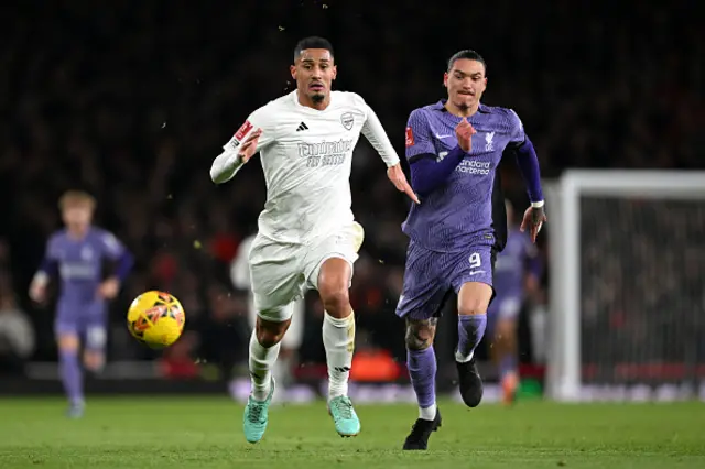 William Saliba of Arsenal and Darwin Nunez of Liverpool battle for possession