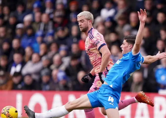 Leeds United's Patrick Bamford and Peterborough United's Ronnie Edwards battle for the ball