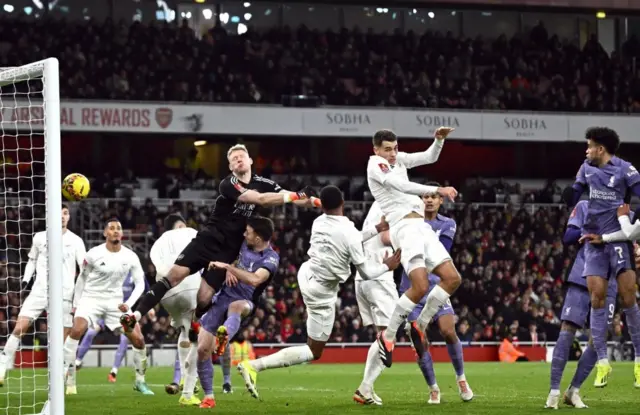 Jakub Kiwior deflects a corner from Trent Alexander-Arnold cross