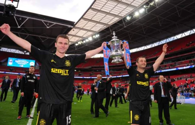 Wigan and Shaun Maloney celebrate winning the FA Cup in 2013