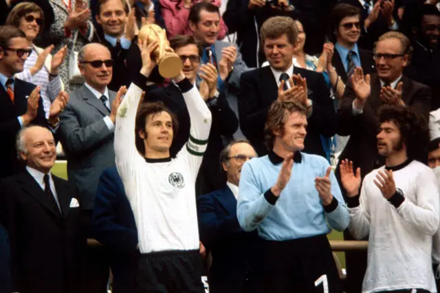 Franz Beckenbauer lifting the World Cup