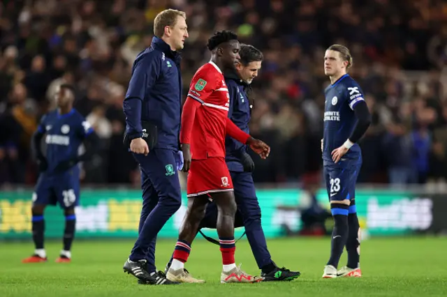 Alex Bangura of Middlesbrough leaves the pitch injured