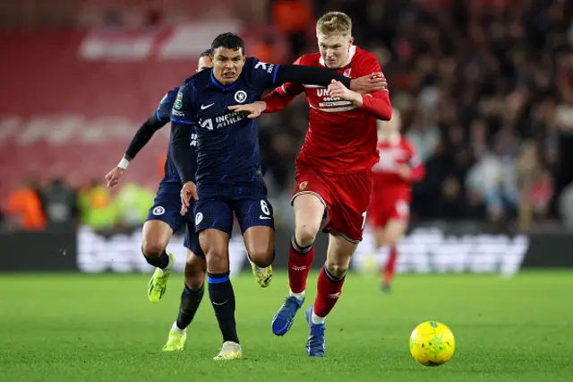 Thiago Silva of Chelsea and Josh Coburn of Middlesbrough battle for the ball