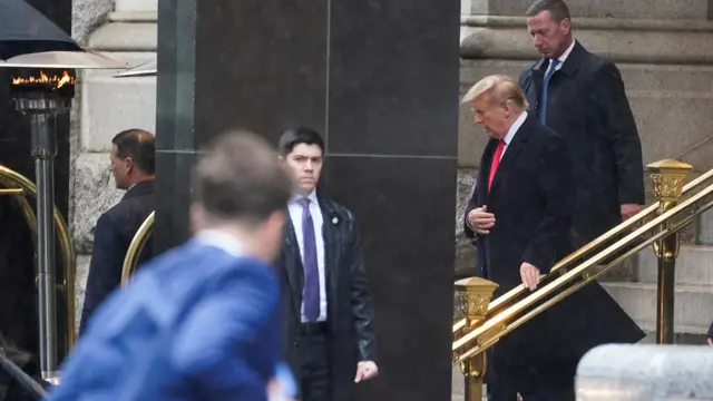 ormer U.S. President Donald Trump departs after a brief press conference at a hotel, following his hearing at District Court on Trump's claim of immunity in the federal case accusing him of illegally attempting to overturn his 2020 election defeat, in Washington, U.S., January 9, 2024. REUTERS/Nathan Howard