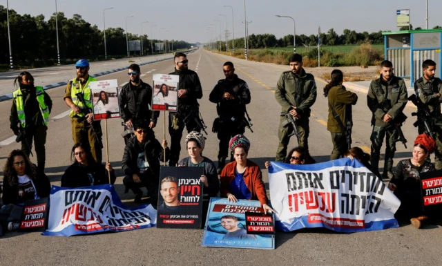 Family members of Israelis kidnapped by Hamas gunmen demonstrate against the entry of humanitarian aid to the Gaza Strip until the hostages are freed near the Kerem Shalom crossing