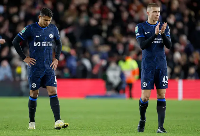 Thiago Silva and Alfie Gilchrist of Chelsea look dejected