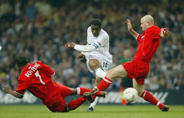 Jay Jay Okocha of Bolton Wanderers fires in a shot