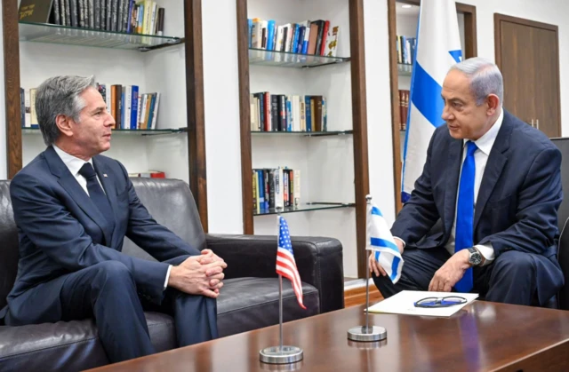 Israeli Prime Minister Benjamin Netanyahu (R) meeting with the US Secretary of State Antony Blinken at the Kirya military base in Tel Aviv