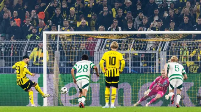 DORTMUND, GERMANY - OCTOBER 01: Borussia Dortmund’s Emre Can scores a penalty to make it 1-0 during a UEFA Champions League matchday two League Phase match between Borussia Dortmund and Celtic at the Signal Iduna Park, on October 01, 2024, in Dortmund, Germany. (Photo by Craig Williamson / SNS Group)