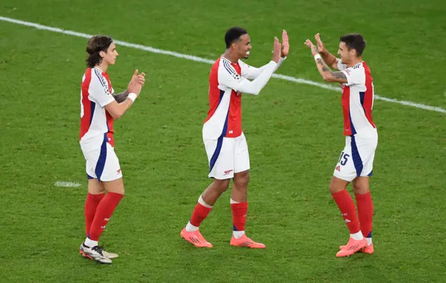 Gabriel, Kiwior and Calafiori celebrate at full time