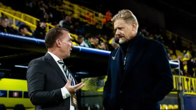 DORTMUND, GERMANY - OCTOBER 01: Celtic Manager Brendan Rodgers and Peter Schmeichel during a UEFA Champions League matchday two League Phase match between Borussia Dortmund and Celtic at the Signal Iduna Park, on October 01, 2024, in Dortmund, Germany. (Photo by Craig Williamson / SNS Group)