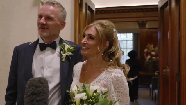 Daniella and Ean at Old Marylebone Town Hall after their wedding