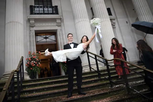 Priscilla Wong and Bradley Standfield after getting married at Old Marylebone Town Hall, 1 October 2024