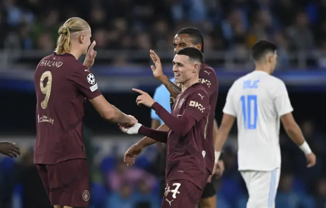 City players celebrate their second goal via Phil Foden