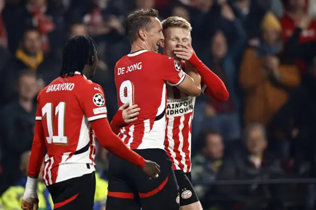 PSV players celebrate their opener