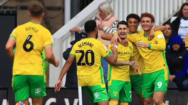 Norwich players celebrate one of Borja Sainz's three goals against Derby on Saturday