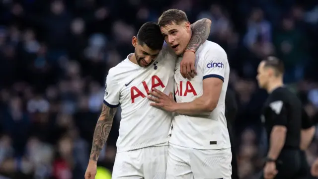 Tottenham Hotspur's Cristian Romero (left) celebrates victory at the end of the match with team mate Micky van de Ven during the Premier League match between Tottenham Hotspur and Crystal Palace at Tottenham Hotspur Stadium on March 2, 2024 in London, England.