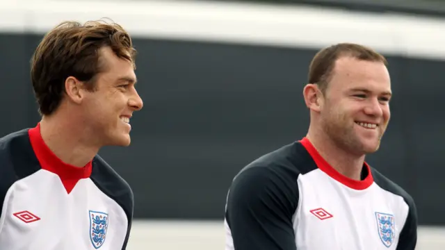 Scott Parker and Wayne Rooney smiling while on England duty in 2011