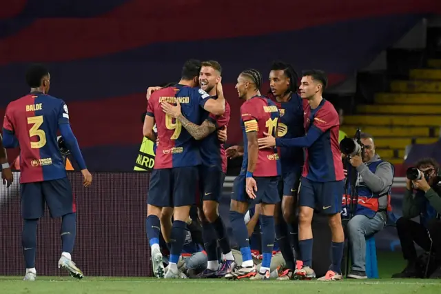 Barcelona players congratulate Martinez for his goal