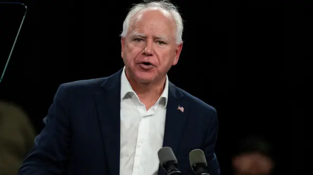 Democratic VP nominee Tim Walz speaks to a crowd at an election campaign event in Superior, Wisconsin in September