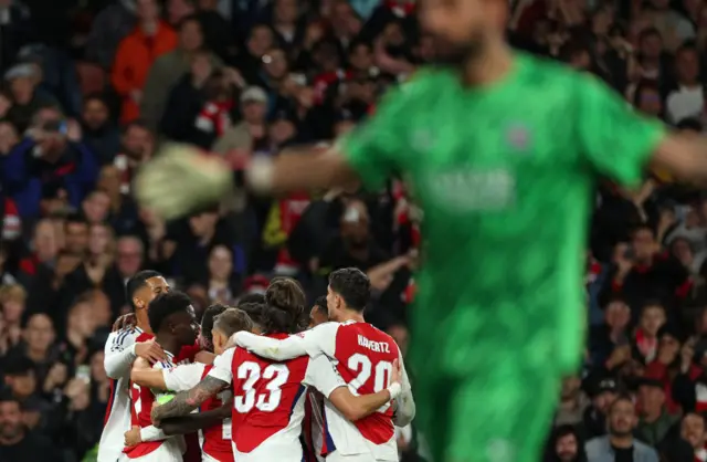 Arsenal celebrate as Donnarumma commiserates