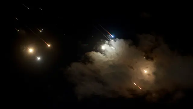 Projectiles lighting up the skies over Jerusalem earlier today