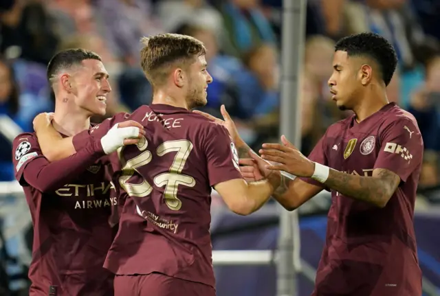 City players celebrate their fourth goal