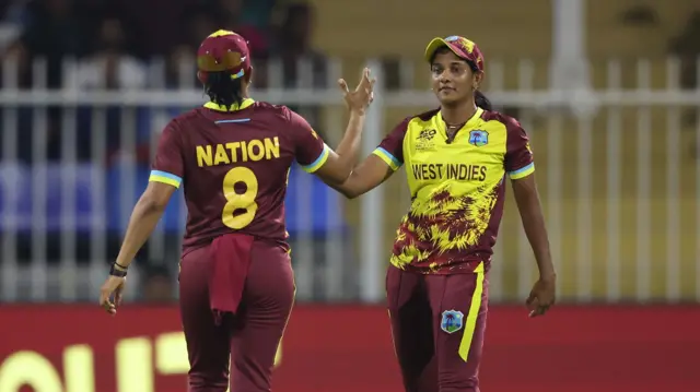 Karishma Ramharack (right) celebrates