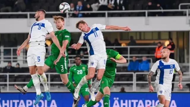 Liam Scales heads Republic of Ireland level against Finland