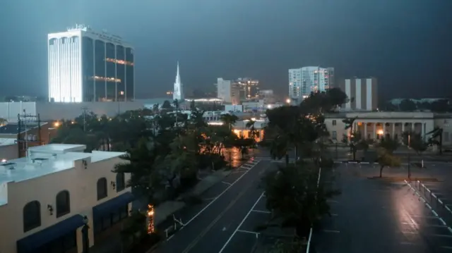Buildings and trees stand, as Hurricane Milton approaches Sarasota