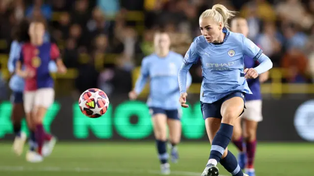Alex Greenwood makes a pass while playing for Manchester City against Barcelona