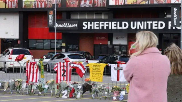 Tributes are laid at Bramall Lane following the death of former player George Baldock