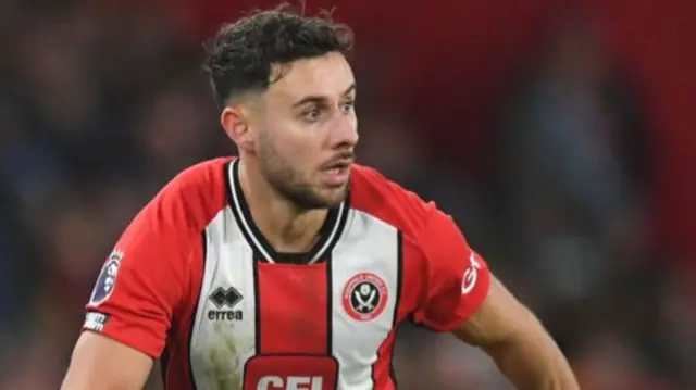 George Baldock playing for Sheffield United