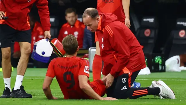 Harry Kane receives treatment while playing for Bayern Munich
