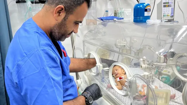 A baby evacuated from a hospital in north Gaza