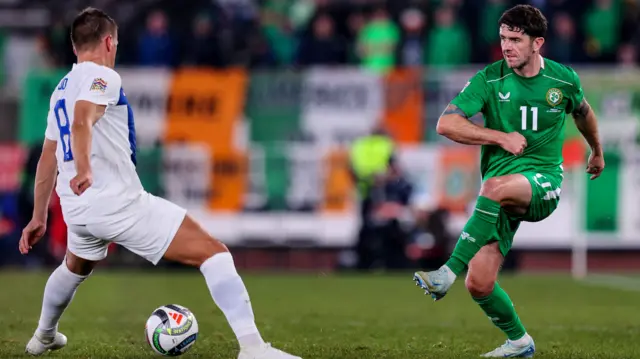 Finland's Robin Lod attempts to block Robbie Brady's pass