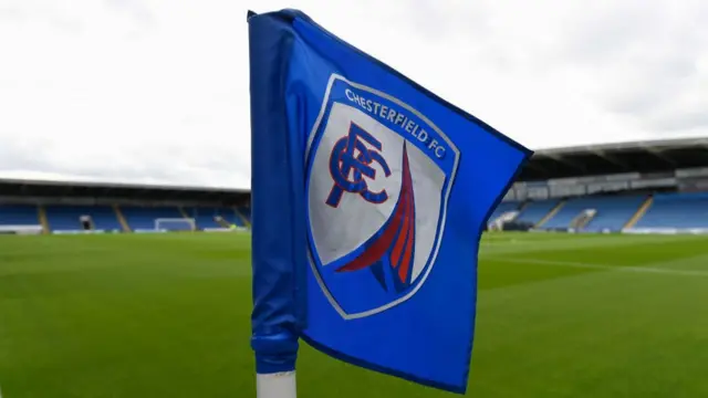 A corner flag with the Chesterfield FC emblem on it