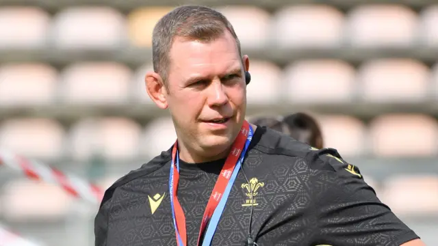 Ioan Cunningham on the pitch before a game