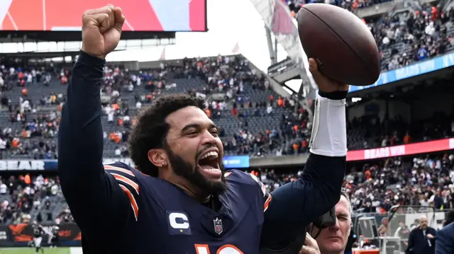 Quarterback Caleb Williams celebrating after a Chicago Bears win