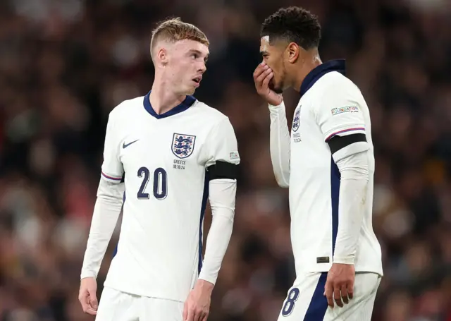 Cole Palmer talks to Jude Bellingham during England's defeat to Greece