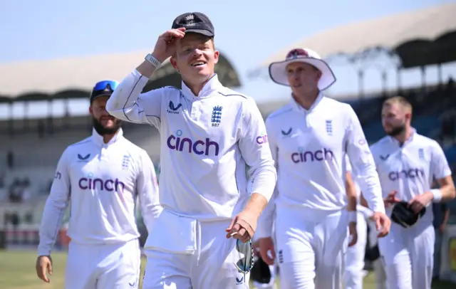 Ollie Pope doughs his cap