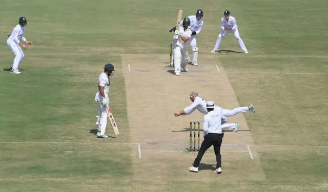 Jack Leach takes a diving catch