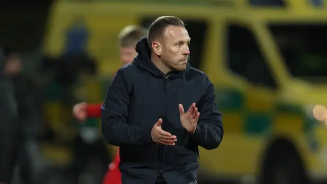 Craig Bellamy applauds during the game in Iceland