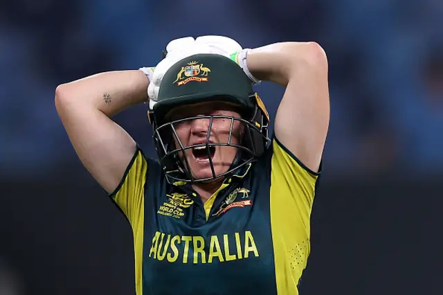 Alyssa Healy of Australia grimaces